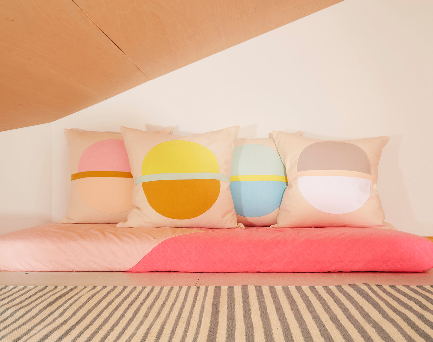 Re:Canvas Arco Cloud Square Pillow placed in bed