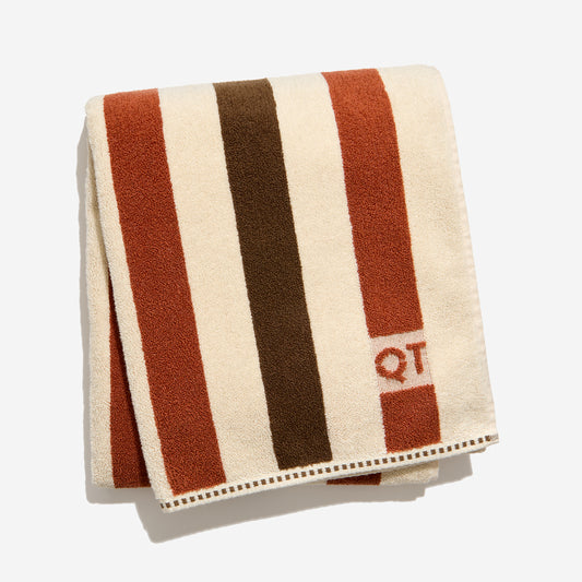 Catalina bath sheet in chocolate folded against a white background. 