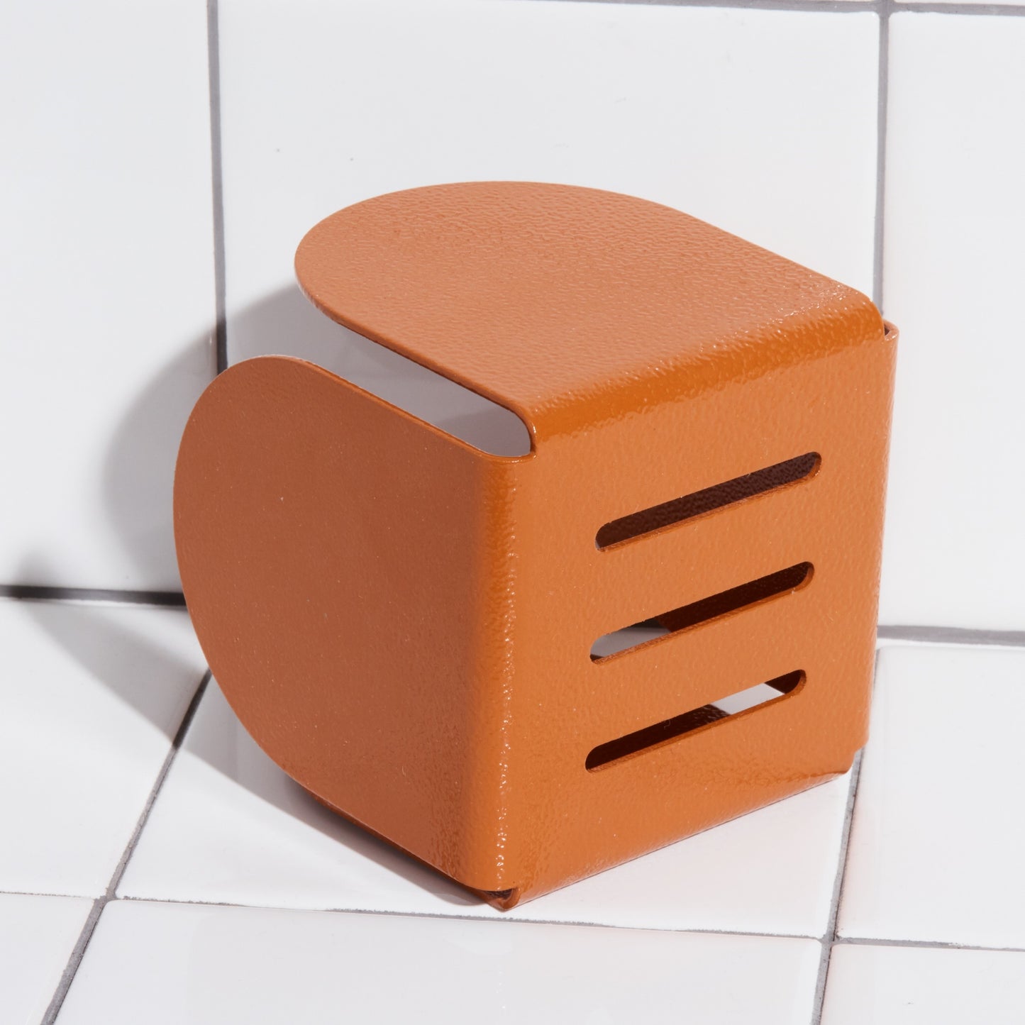 Underside of aluminum basket holder hook in clay.